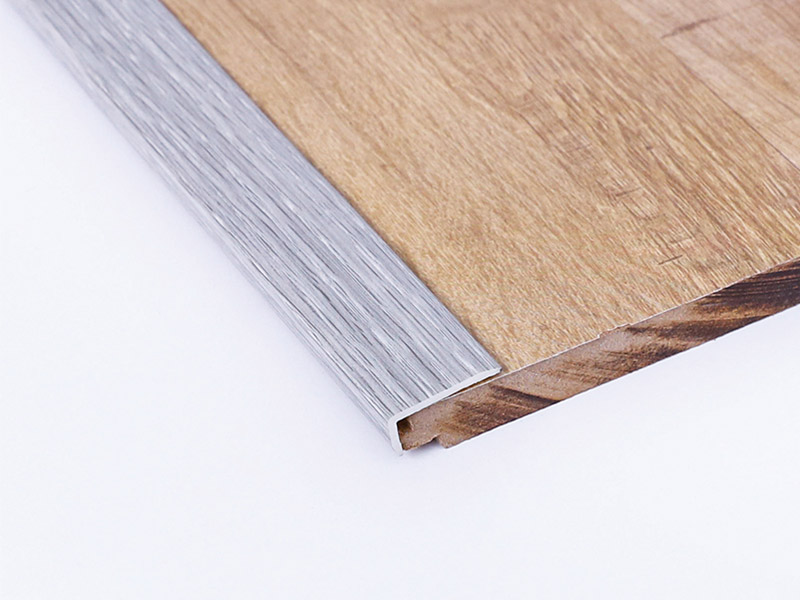 Jalur Tepi Lantai Laminat PVC 24*10mm berbentuk L